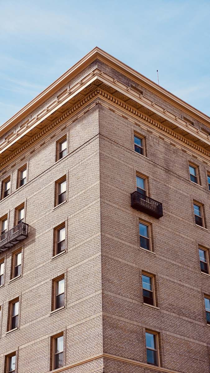 home decor brown concrete building under blue sky during daytime building